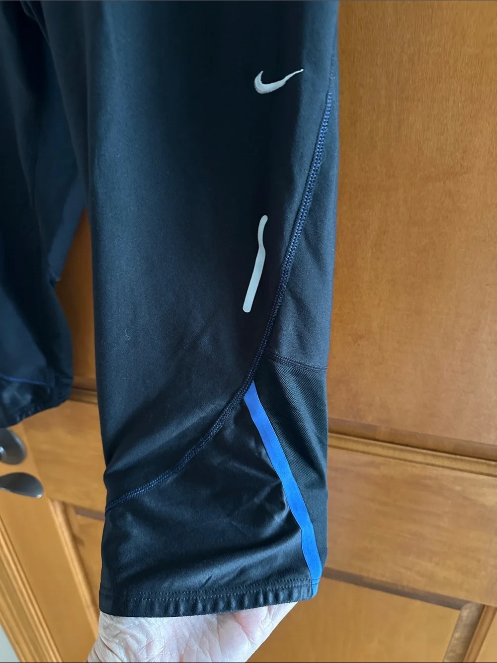 Nike Black Capri Leggings with Blue Trim and White Swoosh Back Zip Pocket Capri